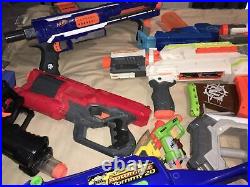 Lot Of Nerf Gun And Extra Pieces And Darts