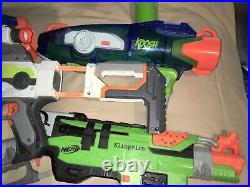 Lot Of Nerf Gun And Extra Pieces And Darts